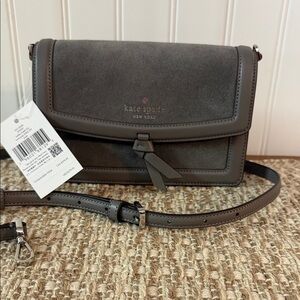 Kate Spade Knott Suede Mini Flap Crossbody bag in the color Hare Grey. MSRP $279